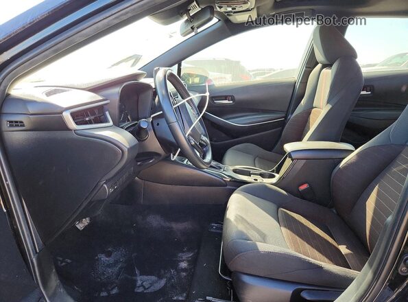JTDP4MCEXPJ101794 2023 TOYOTA COROLLA Black Front interior view