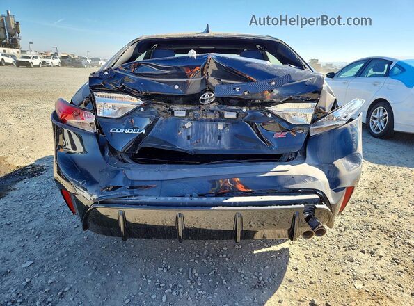 JTDP4MCEXPJ101794 2023 TOYOTA COROLLA Black Rear view