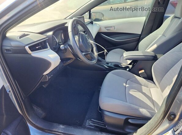 JTDS4MCE9MJ070561 2021 TOYOTA COROLLA Синий Вид салона спереди