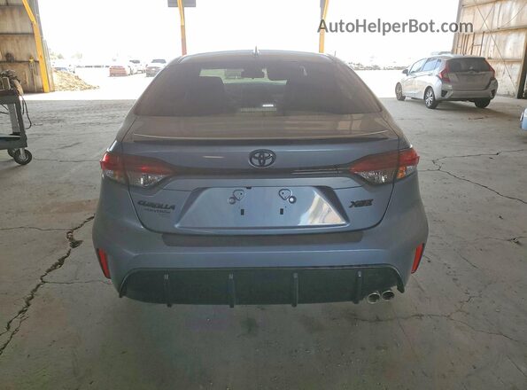 JTDT4MCE4T3531611 2026 TOYOTA COROLLA Серый Вид сзади