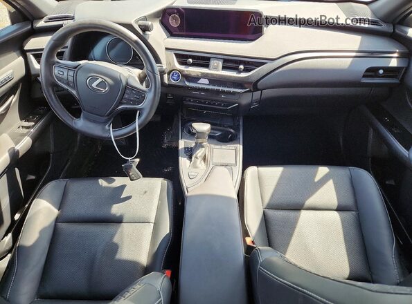 JTHL9JBH0M2042690 2021 LEXUS UX Белый Вид панели приборов