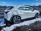 2025 Lexus Ux 300h Base White vin: JTHUCJDH4S2007084