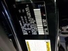 2026 Lexus Rx 450h+ Luxury Gray vin: JTJCJMGA3T2041647