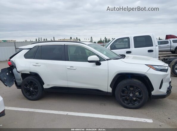 JTM16RFV8NJ022338 2022 TOYOTA RAV4 HYBRID White Rear interior view