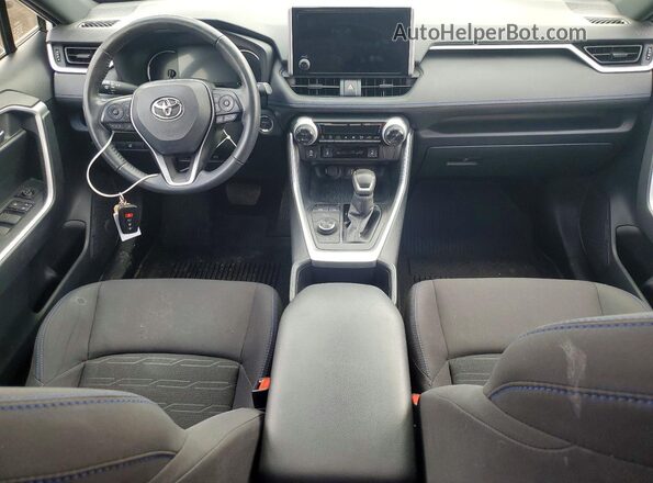 JTM16RFVXPD541084 2023 TOYOTA RAV4 White Dashboard view