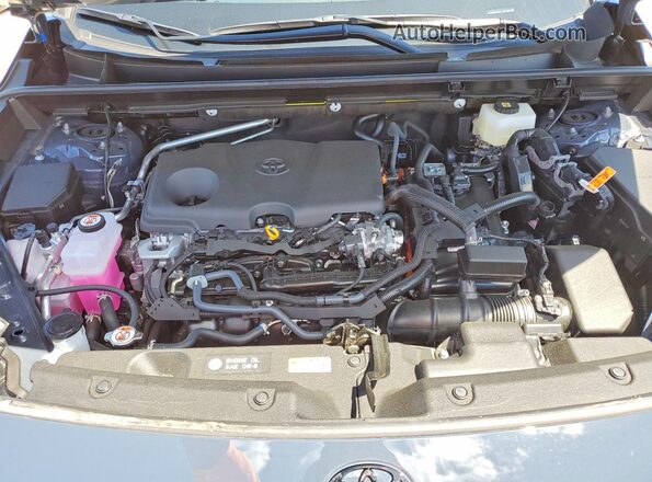 JTM6CRAVXTJ001350 2026 TOYOTA RAV4 Gray Vista interior trasera