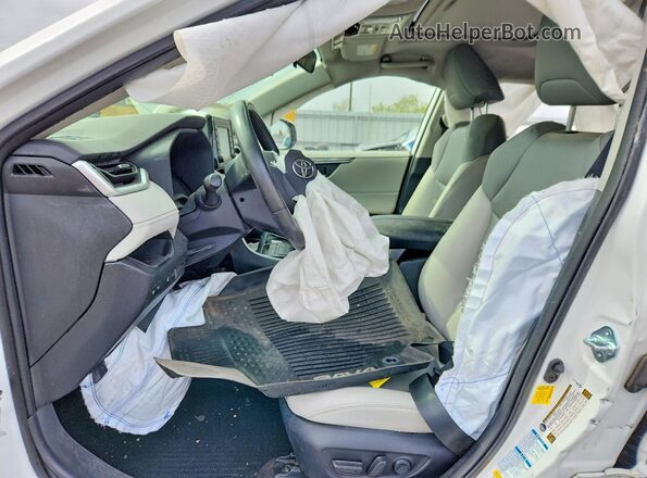 JTMA1RFV6KD018104 2019 TOYOTA RAV4 Белый Вид салона спереди