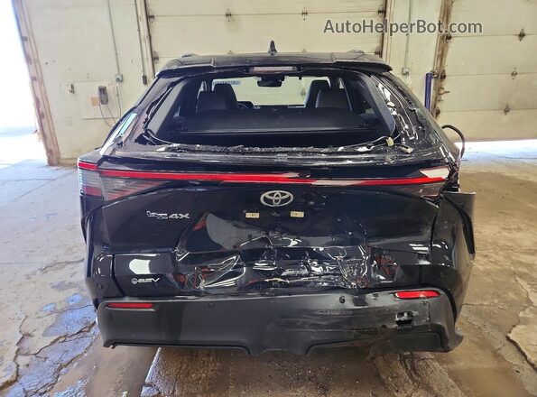 JTMAAAAA7RA047693 2024 TOYOTA BZ4X Black Vista trasera