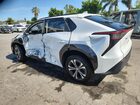 2023 Toyota Bz4x Xle White vin: JTMAAAAAXPA001093 Damage: Left Qtr Panel, Severe Damage, Replacement Required