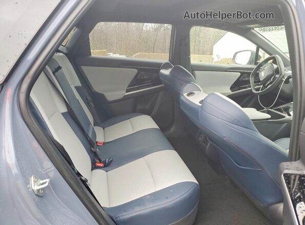 JTMABABA7RA051464 2024 SUBARU SOLTERRA Blue Vista interior trasera