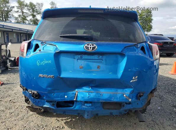 JTMBFREV0GD181801 2016 TOYOTA RAV4 Blue Rear view