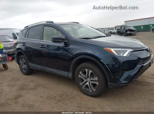 JTMBFREV0JJ730941 2018 TOYOTA LE Dark Blue Вид задней части салона
