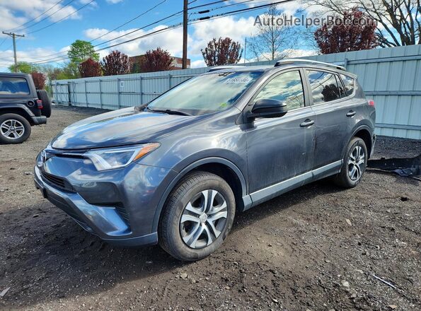 JTMBFREV1GJ056517 2016 TOYOTA RAV4 Charcoal Vista tres cuartos delantera izquierda