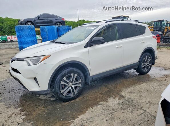 JTMBFREV3GJ056714 2016 TOYOTA RAV4 White Przód lewy