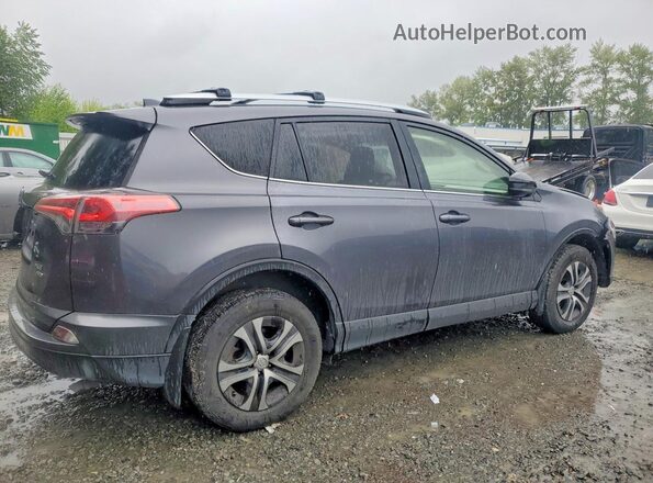 JTMBFREV3GJ097652 2016 TOYOTA RAV4 Gray Tył prawy