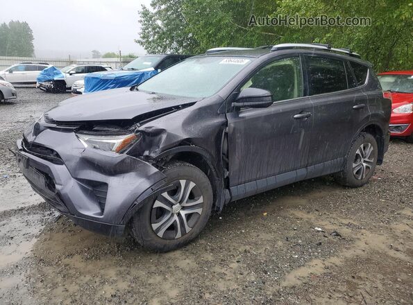 JTMBFREV3GJ097652 2016 TOYOTA RAV4 Gray Przód lewy