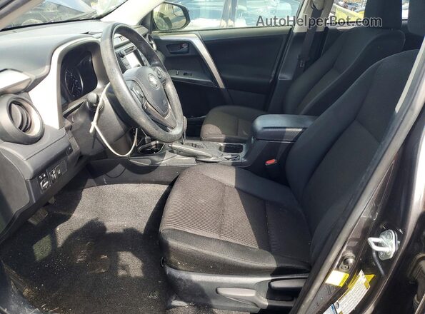 JTMBFREV3JJ730688 2018 TOYOTA RAV4 Gray Vista interior delantera