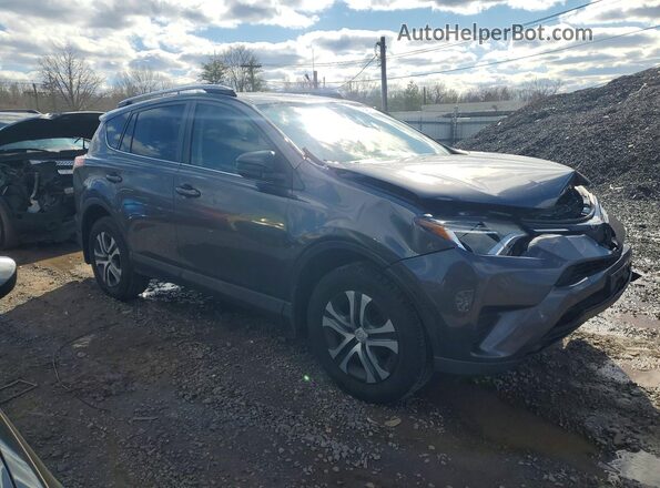 JTMBFREV3JJ730688 2018 TOYOTA RAV4 Gray Delantero derecho