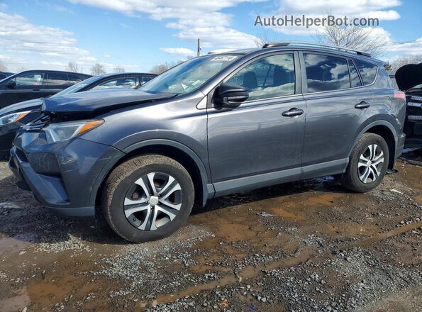 JTMBFREV3JJ730688 2018 TOYOTA RAV4 Gray Vista tres cuartos delantera izquierda