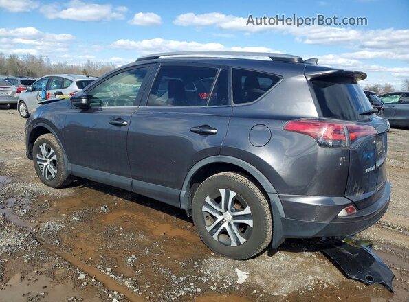 JTMBFREV3JJ730688 2018 TOYOTA RAV4 Gray Trasero izquierdo