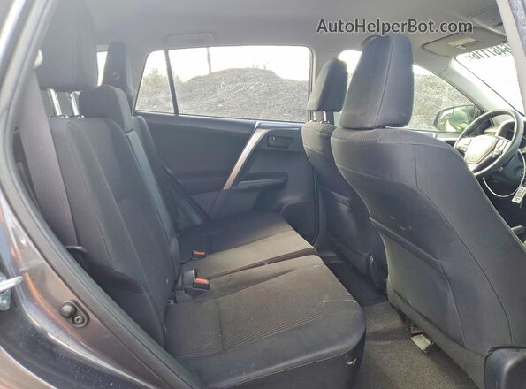 JTMBFREV3JJ730688 2018 TOYOTA RAV4 Gray Vista interior trasera