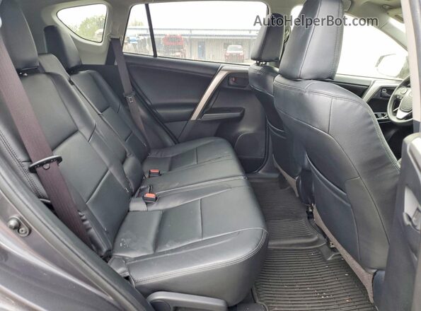 JTMBFREV3JJ731176 2018 TOYOTA RAV4 Gray Вид задньої частини салону