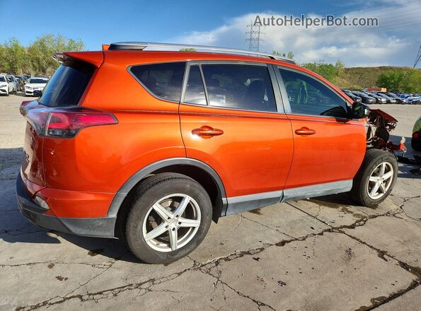 JTMBFREV4GJ066765 2016 TOYOTA RAV4 Orange Задня права чверть