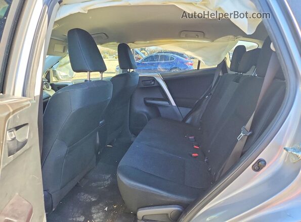 JTMBFREV6JJ196201 2018 TOYOTA LE Серебряный Вид задней части салона
