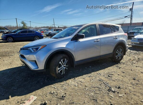 JTMBFREV6JJ196201 2018 TOYOTA LE Серебряный Передняя левая четверть
