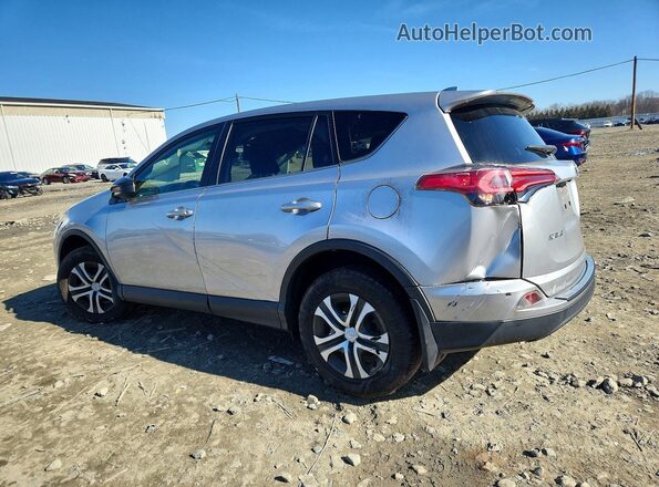 JTMBFREV6JJ196201 2018 TOYOTA LE Серебряный Задняя левая четверть