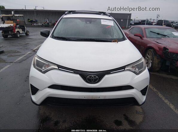 JTMBFREV7JJ186289 2018 TOYOTA LE White Вид задньої частини салону