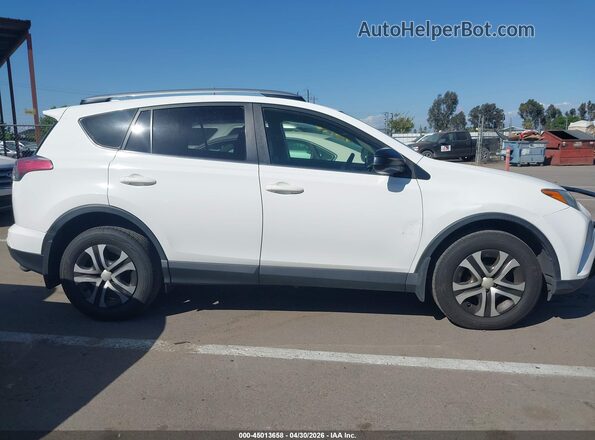 JTMBFREVXJJ719977 2018 TOYOTA LE White Widok wnętrza z tyłu