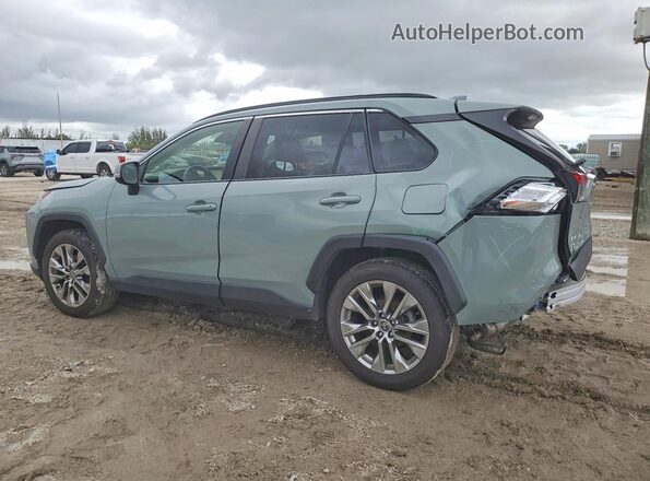 JTMC1RFV5LD049886 2020 TOYOTA RAV4 Бирюзовый Задняя левая четверть