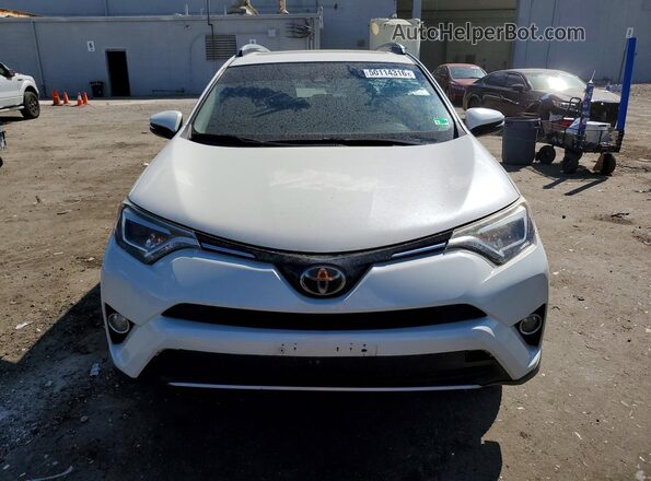 JTMDFREV0JJ193206 2018 TOYOTA RAV4 White Вид спереду