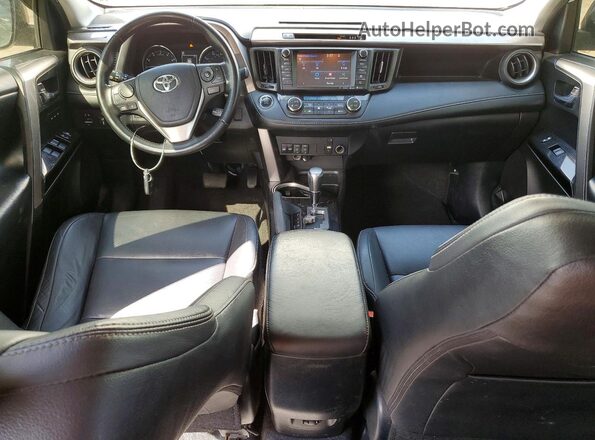 JTMDFREV0JJ193206 2018 TOYOTA RAV4 White Вид панелі приладів