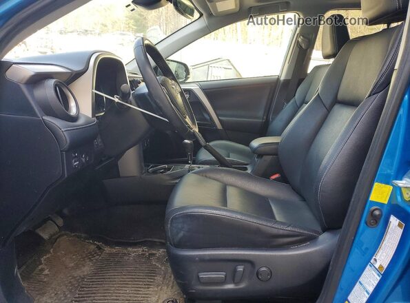 JTMDFREV7GD175602 2016 TOYOTA RAV4 Blue წინა სალონის ხედი