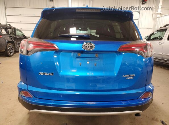 JTMDFREV9GD180462 2016 TOYOTA RAV4 Blue Rear view