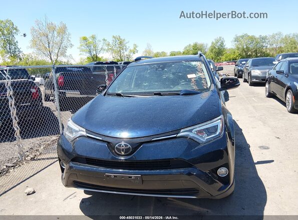 JTMDFREV9JJ185427 2018 TOYOTA RAV4 Синий Вид щитка приборов