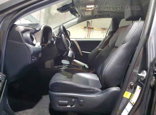 JTMDJREV2JD232147 2018 TOYOTA RAV4 Charcoal Vista interior delantera
