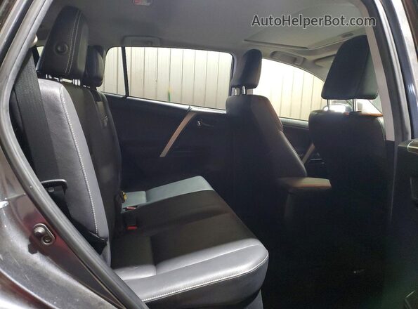 JTMDJREV2JD232147 2018 TOYOTA RAV4 Charcoal Vista interior trasera