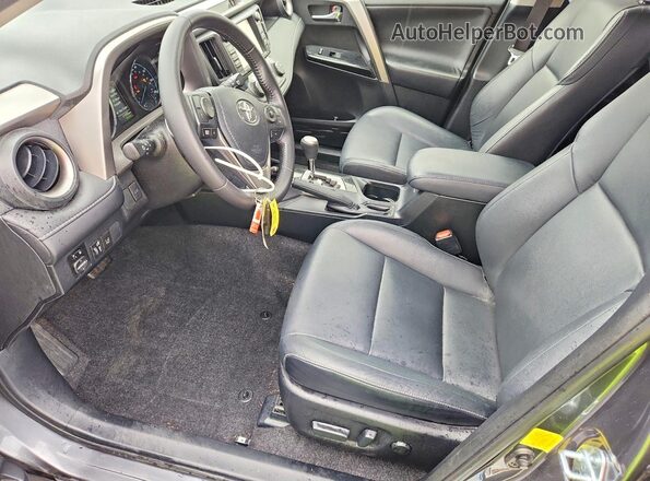 JTMDJREV3HD092331 2017 TOYOTA RAV4 Charcoal Widok wnętrza z przodu