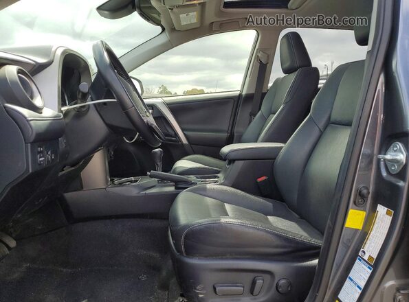 JTMDJREV7GD053773 2016 TOYOTA RAV4 Black Widok wnętrza z przodu