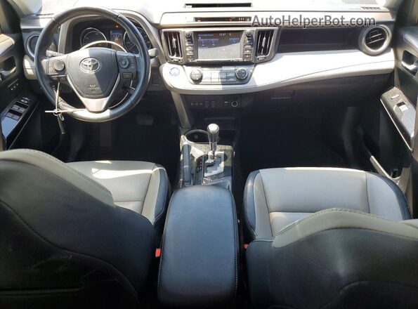 JTMDJREV8JD230726 2018 TOYOTA RAV4 Серебряный Вид панели приборов