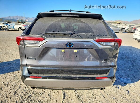 JTME6RFV1RJ051395 2024 TOYOTA RAV4 Charcoal Rear view