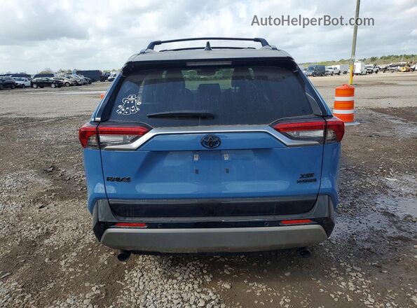 JTME6RFV5RD559366 2024 TOYOTA RAV4 Blue Vista trasera