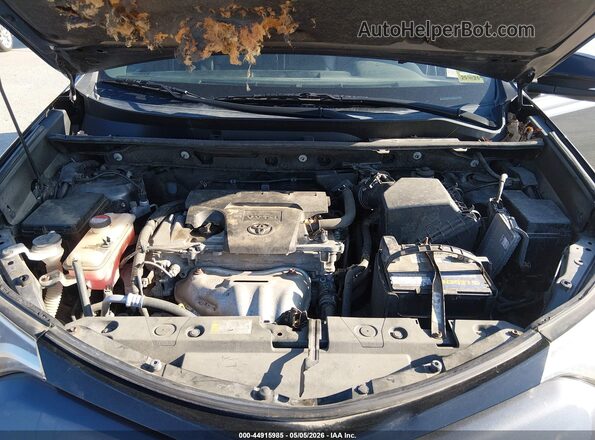 JTMJFREV0GJ070470 2016 TOYOTA RAV4 Gray Widok z tyłu