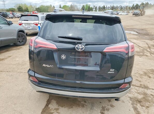 JTMJFREV7GJ067484 2016 TOYOTA RAV4 Black Vista trasera