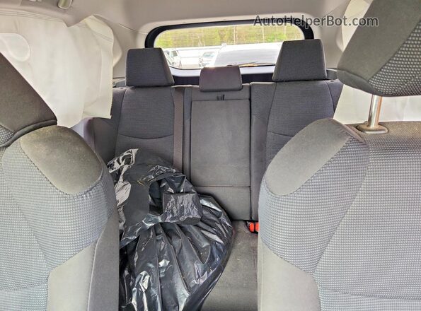JTMMWRFVXRD274285 2024 TOYOTA RAV4 Charcoal Vista de los asientos traseros