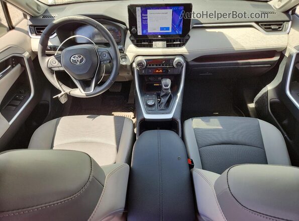 JTMN1RFV4PD094123 2023 TOYOTA RAV4 Белый Вид панели приборов