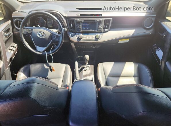 JTMNFREV8HD100140 2017 TOYOTA RAV4 Белый Вид панели приборов